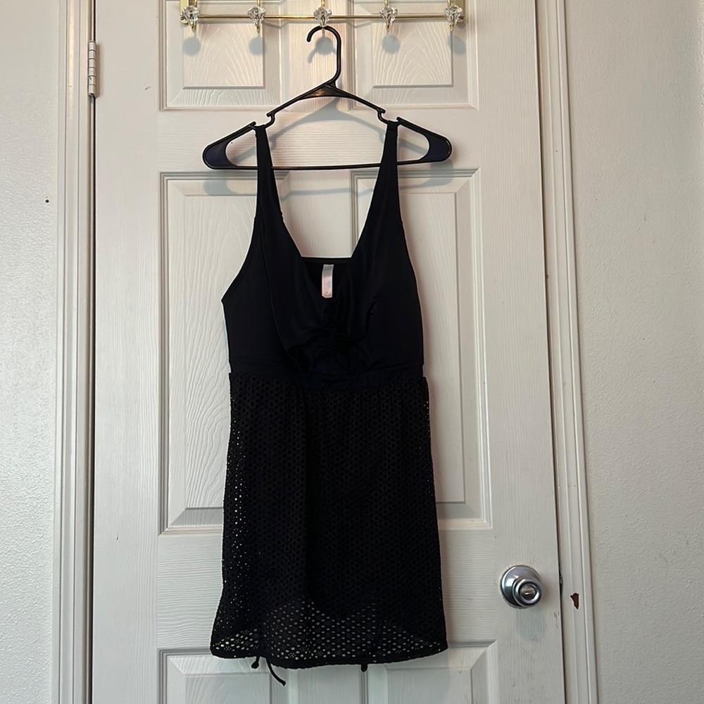 A One piece Swim Suit with a skirt attached